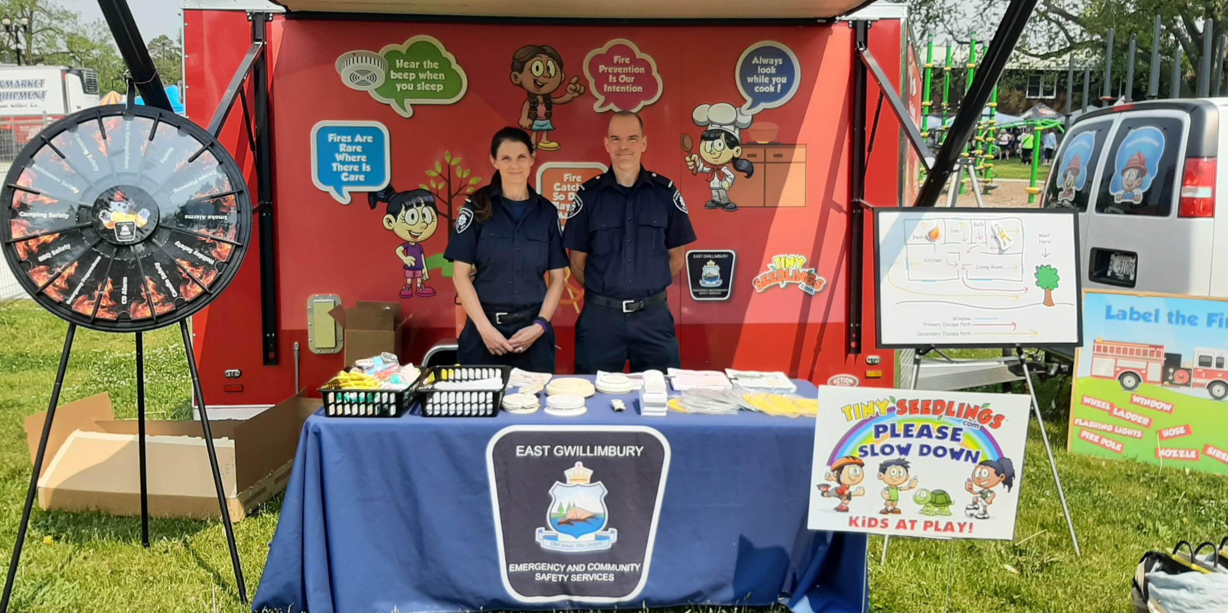 Fire and Emergency Services staff at their Farmers Market booth