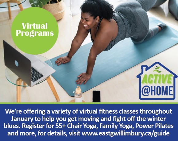 Black woman doing virtual yoga workout