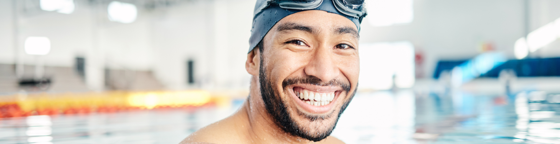 Man in pool smiling