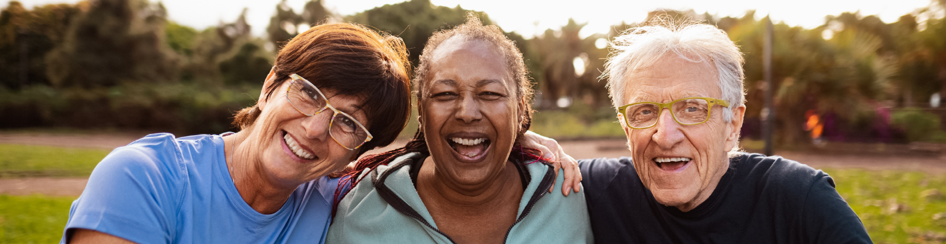 Seniors together laughing outside