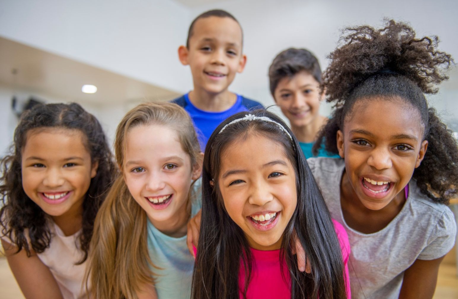 Children smiling at camera