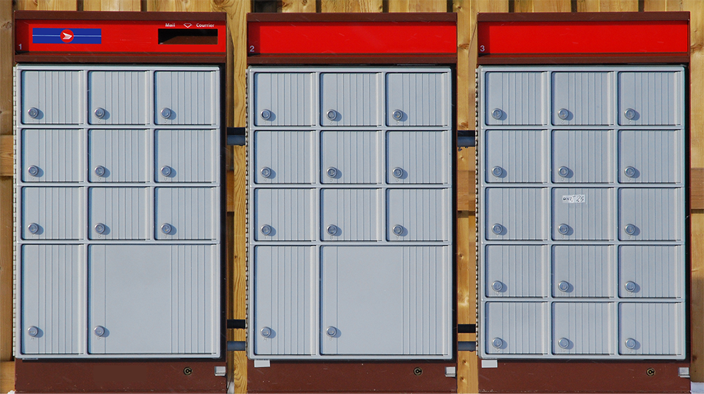 Brown and grey mailboxes lined up